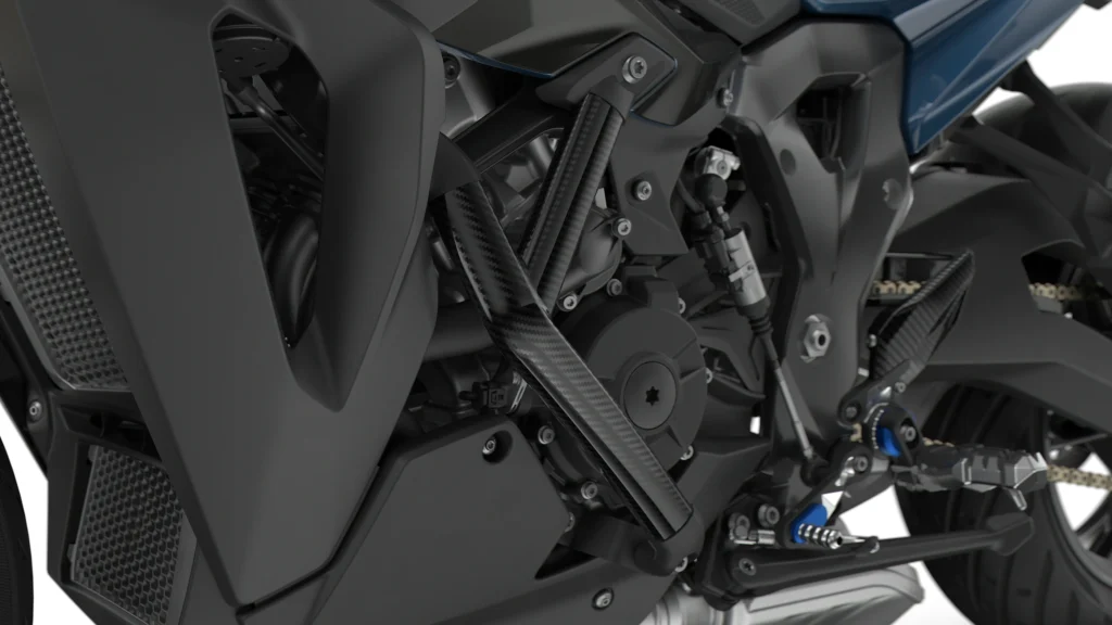 BMW S 1000 XR on an open road, providing excellent stability and power, ideal for two-up sport touring with a passenger.